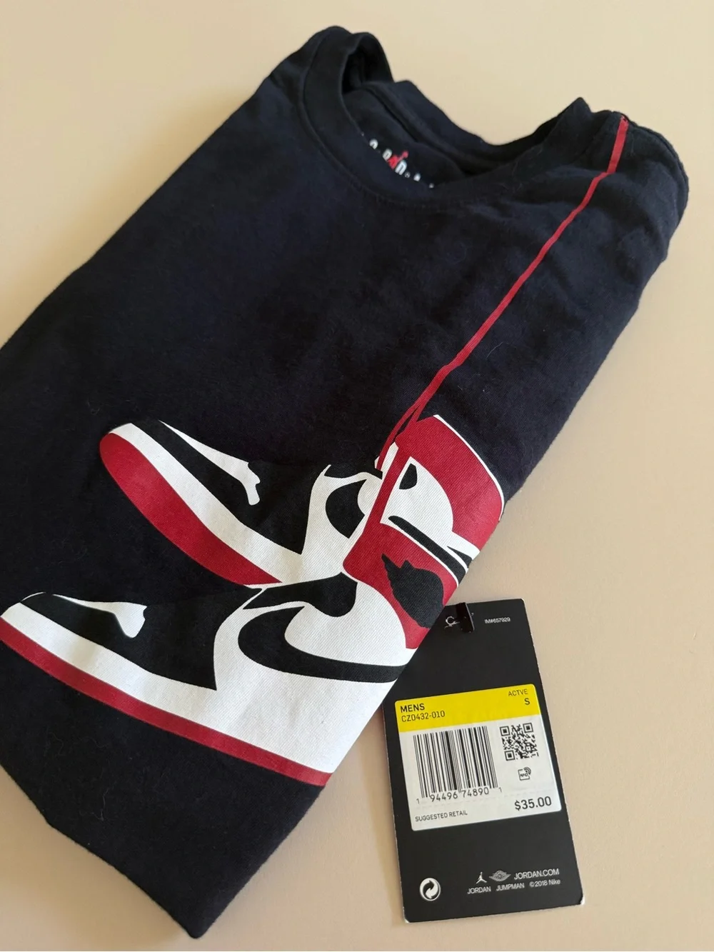 Jordan Men’s Black T‑Shirt with Red and White Sneaker Graphic